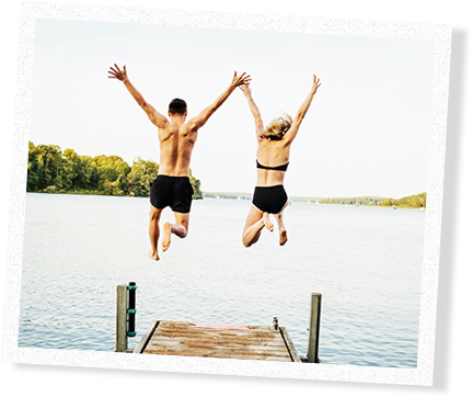 Couple jump in lake