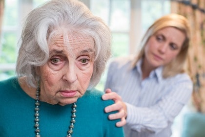 confused-senior-woman-with-dementia-adult-daughter-at-home