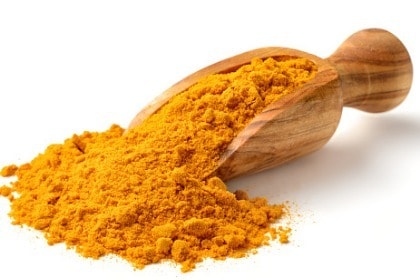 turmeric-powder-in-the-wooden-scoop-curcumin