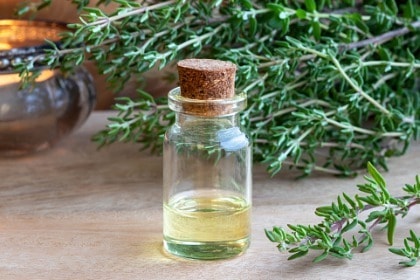 bottle-of-thyme-essential-oil-with-fresh-thyme