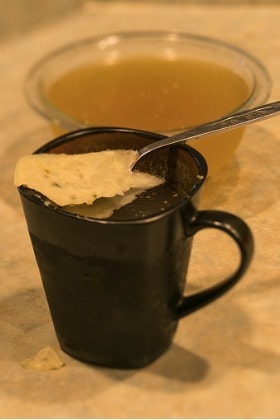 removing-the-fat-from-a-cup-of-bone-broth
