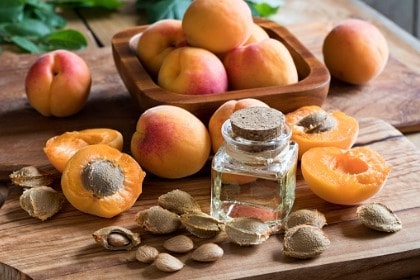 bottle-of-apricot-kernel-oil-with-fresh-apricots