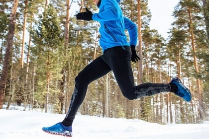 legs-of-athlete-runner-training-outside-in-winter