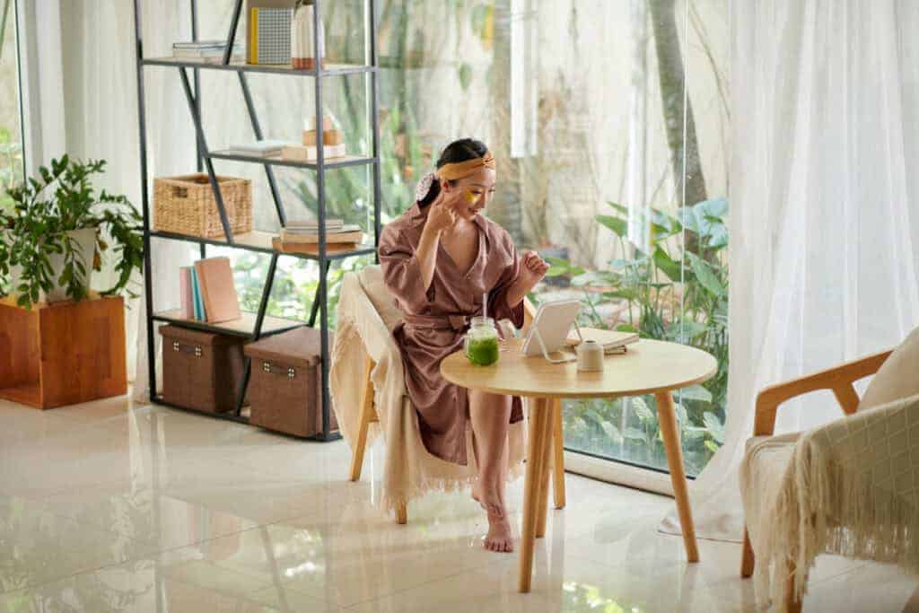 Woman doing her morning skincare routine.