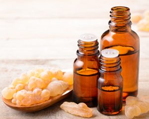 rankincense essential oil and frankincense on the table