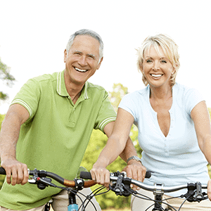 Older Couple Riding Bikes