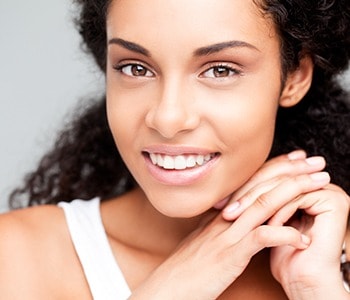 Beautiful young African-American woman smiling.