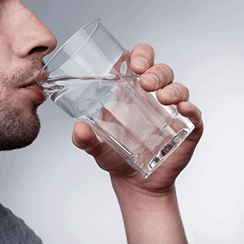 Man Drinking Plenty of Water