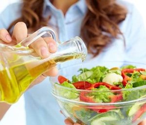 Healthy Dressing Poured on a Salad
