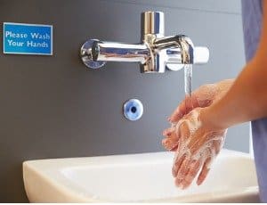 close-up-of-medical-staff-washing-hands