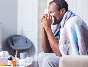 man sick with cold or flu